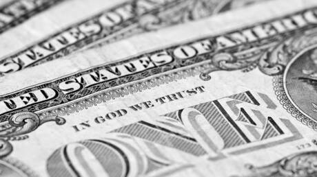 What happened to the dollar after the US Federal Reserve raised interest rates?

